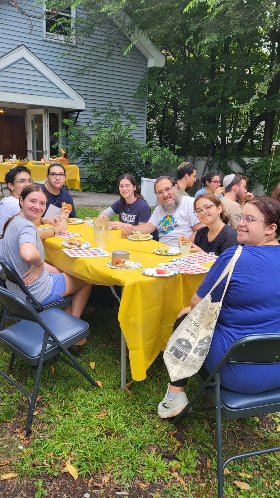 Students at an outdoor barbecue at the Chabad House