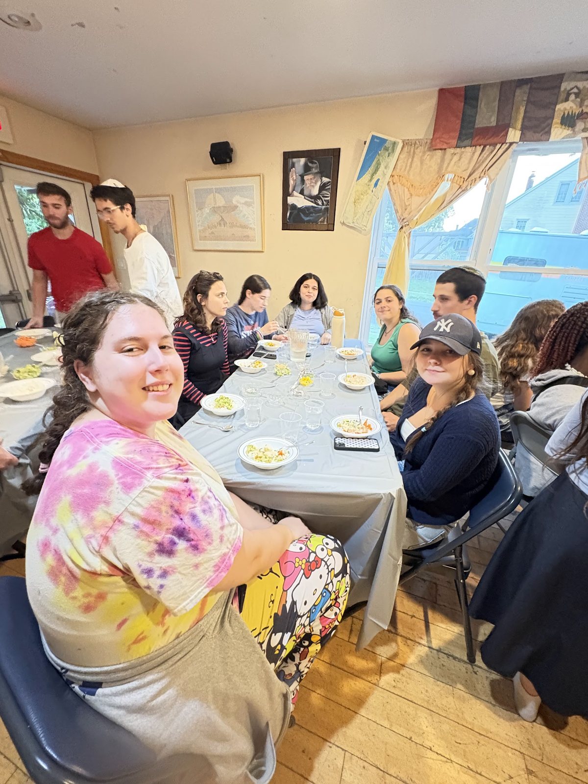 Students at a Friday night Shabbat dinner at the Chabad House